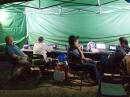 Late night in the digital tent – Greg DesBrisay, Tom Dunbar, Bill Fehring, and Amy Herndon (photo by Bill Frantz)